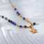 Stainless Steel Necklace with Blue Patterned Beads thumbnail 1