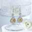 Boucles d'oreilles Vierge en acier inoxydable Lonceen avec perle CZ thumbnail 1