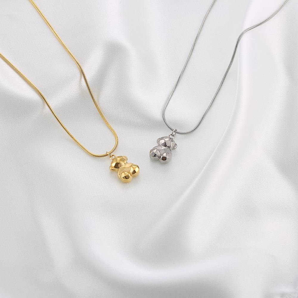 Stainless steel 18K gold plated bear necklace: A fashionable gem with understated luxury design.