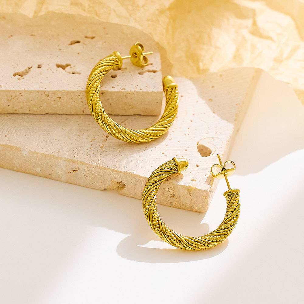 Stainless steel woven fashion fine jewelry earrings, custom retro women's clothing designer gold fine jewelry earrings